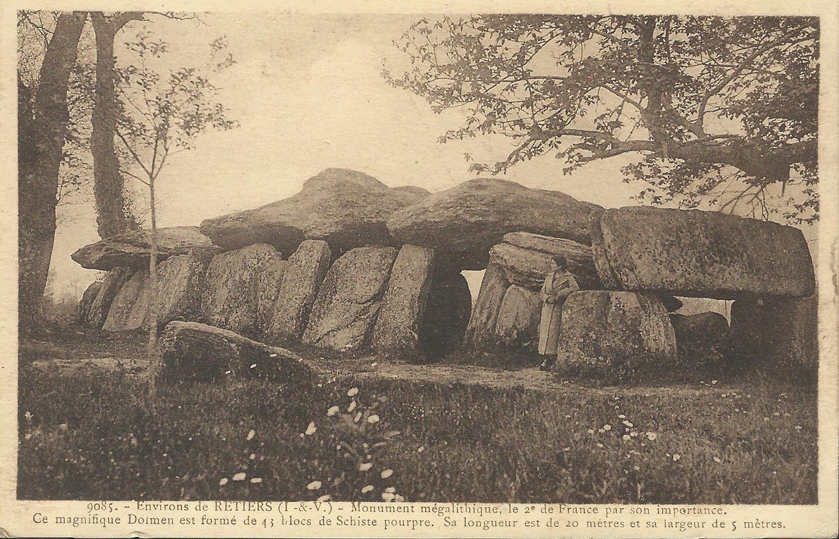 One of the big ones for today’s #TombTuesday, the magnificent Roche aux Fées in Essé (Ille-et-Vilaine), an outlying Breton example of a dolmen angevin. On this early 1920s card a woman stands by the trilith portal entrance, made from dressed blocks, typical of this type of tomb.