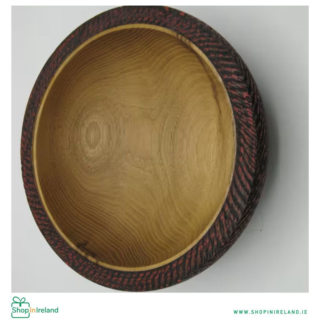 Acacia bowl, approx. 25cm dia, x 8cm high. Textured on the outside and the rim and coloured in black and red.  shopinireland.ie/handmade-acaci… 

#shopinireland #supportsmallbusiness #supportirishbusiness #shoplocal #woodcraft