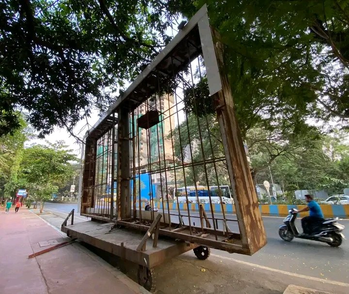 An abandoned, rusting portable hoarding on wheels poses danger to drivers and pedestrians on Pokhran Rd. no. 2. When will the @TMCaTweetAway remove it? #thane #mumbai