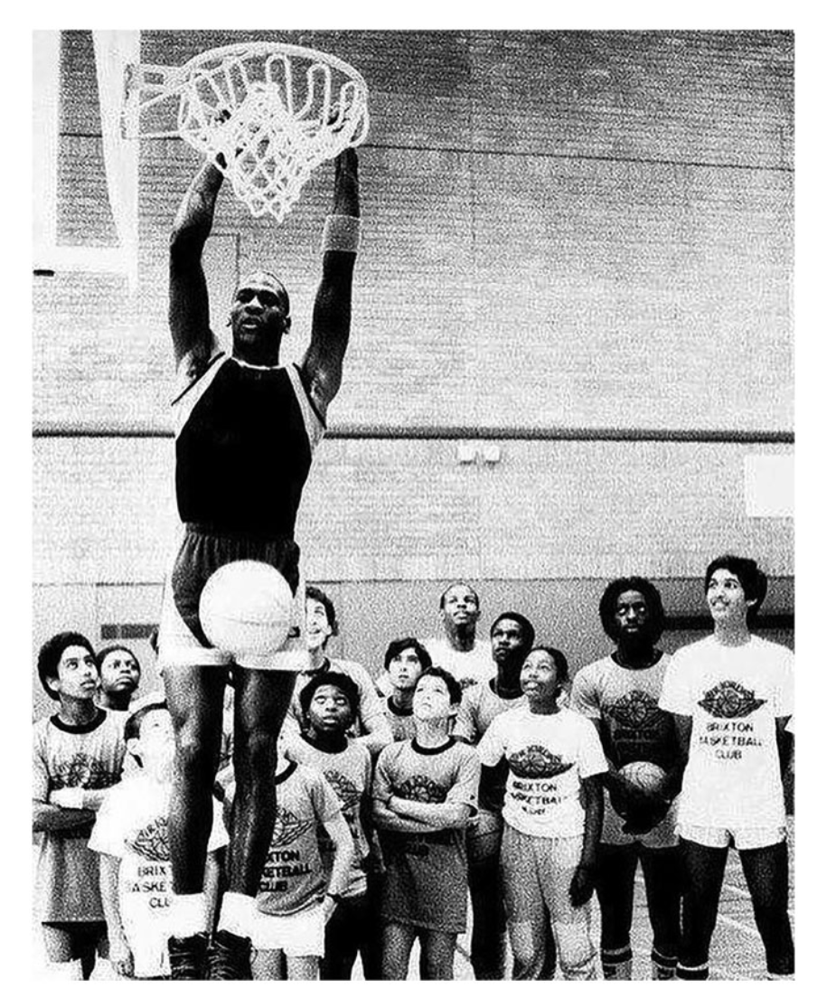 Finally reading @michael_romyn's extraordinary article about Black identity and the history of British basketball which I'm teaching this week, and struck by this incredible image of Michael Jordan at the Brixton Recreation Centre in 1985. academic.oup.com/hwj/article/93…