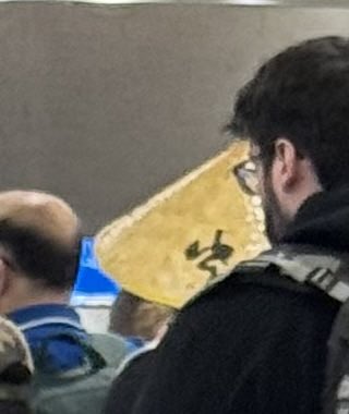 At the airport noticing all the different headwear, then see this