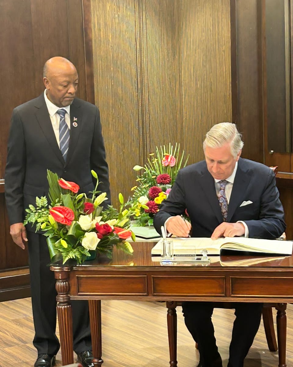 Courtesy... King Phillipe of Belgium signs the visitor’s book at State House. Photo: Isai Sipunga