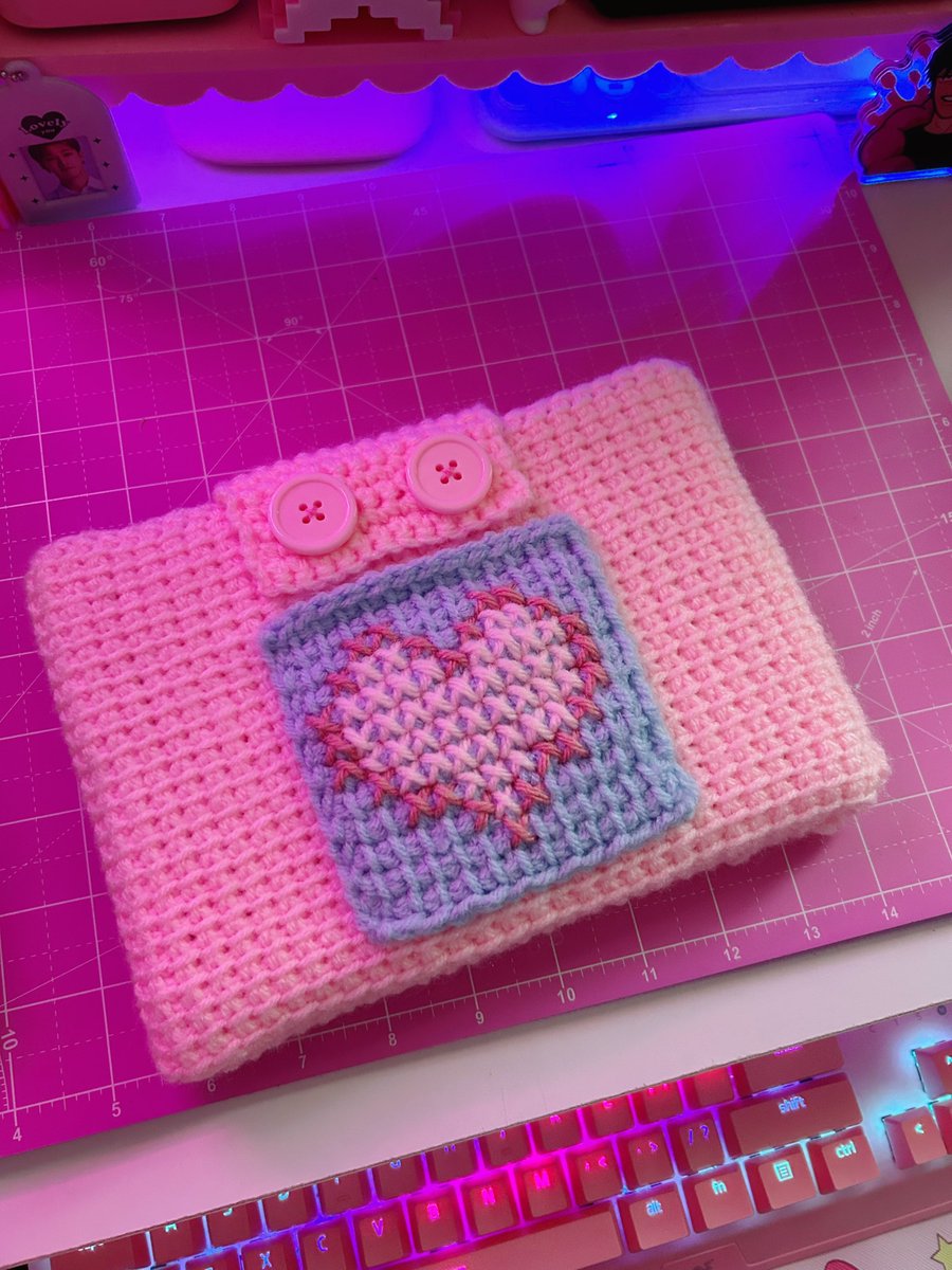 update on the tunisian crochet/cross stitch — i made it into a sleeve for my kindles and cross stitched a lil kirby face on it + a pocket on the back

very simple but now i have the knowledge to make something bigger with this method (i’m thinkin something wearable)