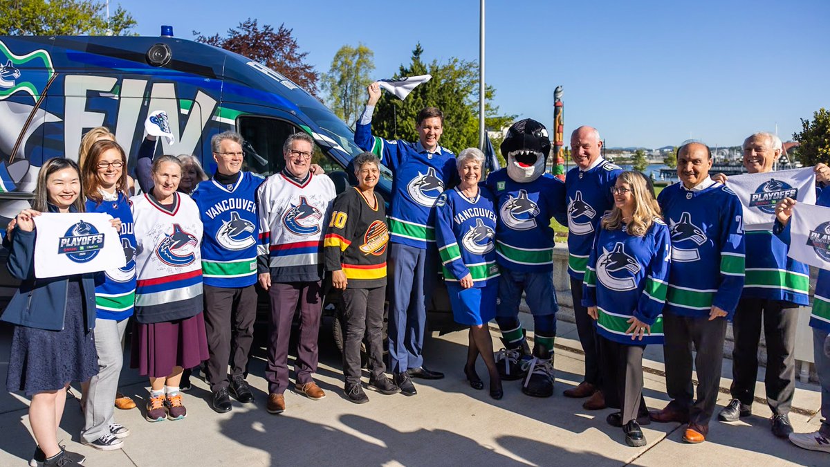 Flying #Canucks colours at the BC Legislature! 🔵⚪️ Today we joined @Dave_Eby, @BCLegSpeaker, @lanapopham, and MLAs from across BC in Victoria to raise a #Canucks flag at the British Columbia Parliament Buildings!