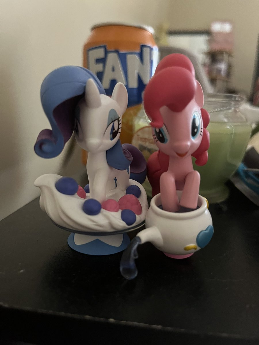 the popmart ponies are a bit silly looking in the eyes department