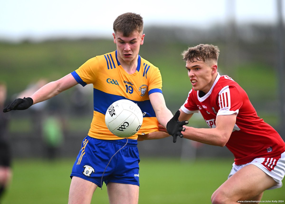 Liam Clune of Clare in action against Harry Cogan of Cork during their Munster Minor Football Championship game at Quilty. Photograph by John Kelly. The final score is @GaaClare 0-08 , @OfficialCorkGAA 1-13 @MunsterGAA #GAA
