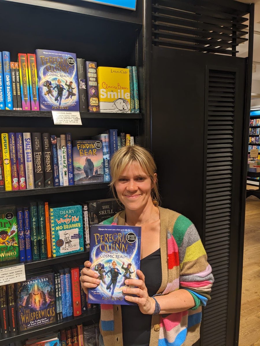 A bookshop day is not complete without sitting on the @WaterstonesPicc moon 🌙! Lots of signed copies of Peregrine waiting there now - and look 👀 a shelf talker! Thank you the lovely Sara for looking after us! @piccadillypress @TheAgencyBooks