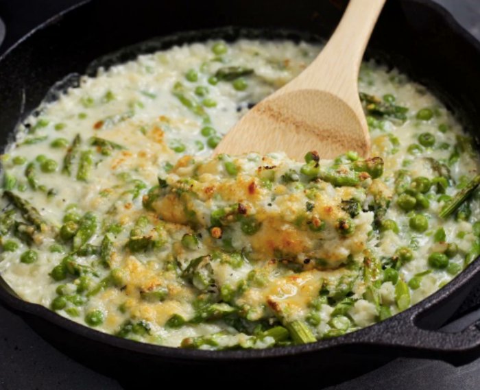 Ellie_Krieger's tweet photo. Thanks to #ricedcauliflower, this one-skillet dish of sauteed #springvegetables in a luxe #Parmesan sauce has a risotto-like vibe. It takes ~20 min to make and is an ideal side w/ grilled chicken, or in a larger portion as a #vegetarian main. https://t.co/hJzeWh4hfC #quickmeal https://t.co/BIw5oVn0Tn