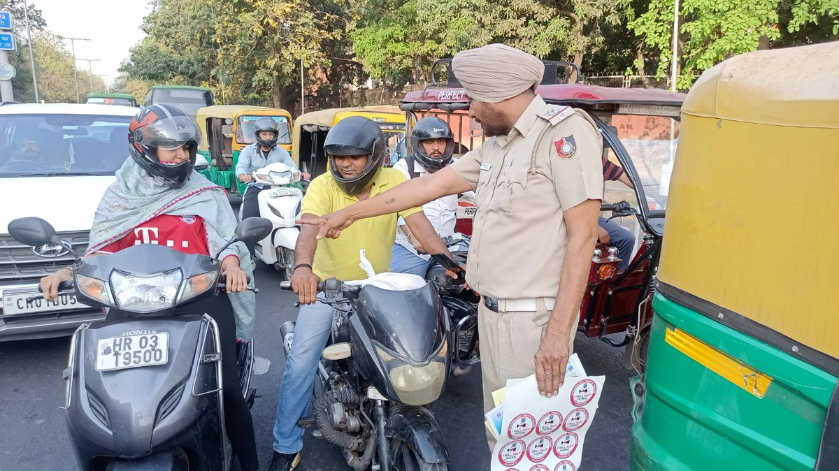 #roadsafetyawareness drive was conducted at PGI Chowk CHD, for the Citizens about Traffic rules & regulations, special emphasis was given on:-
* Importance of wearing proper safety headgear (#helmet), 
* affixing #reflectivetape on helmets for visibility during night to other