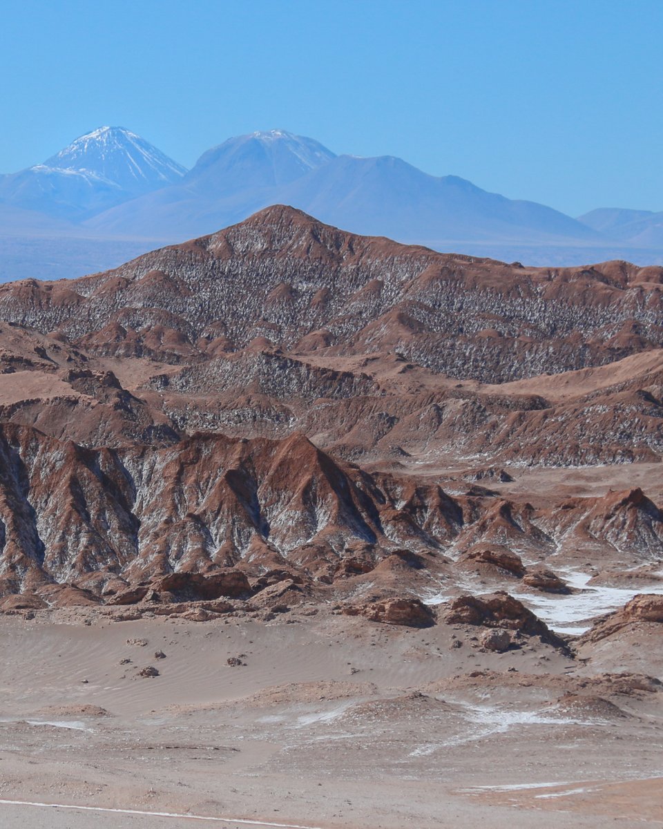 “Chile's Atacama Desert, with its Mars-like terrain and volcanoes in the distance, is an adventure lover's playground.” - a photo by @clairetrickett - @andbeyondtravel Editor | #nayaraaltoatacama