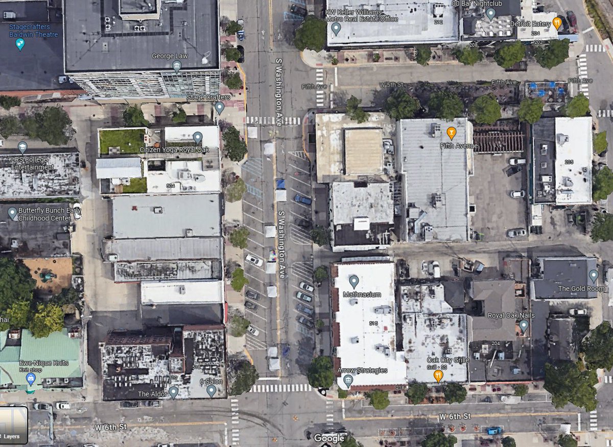 BrianJHearn's tweet photo. This secondary main street in @RoyalOak needs a massive rethinking.  S Washington is could be a huge asset to the city with a set of protected cycling lanes without much effort. It would aid businesses, add capacity, and calm traffic that is already reduced to 25mph. https://t.co/F9STdYUPfZ