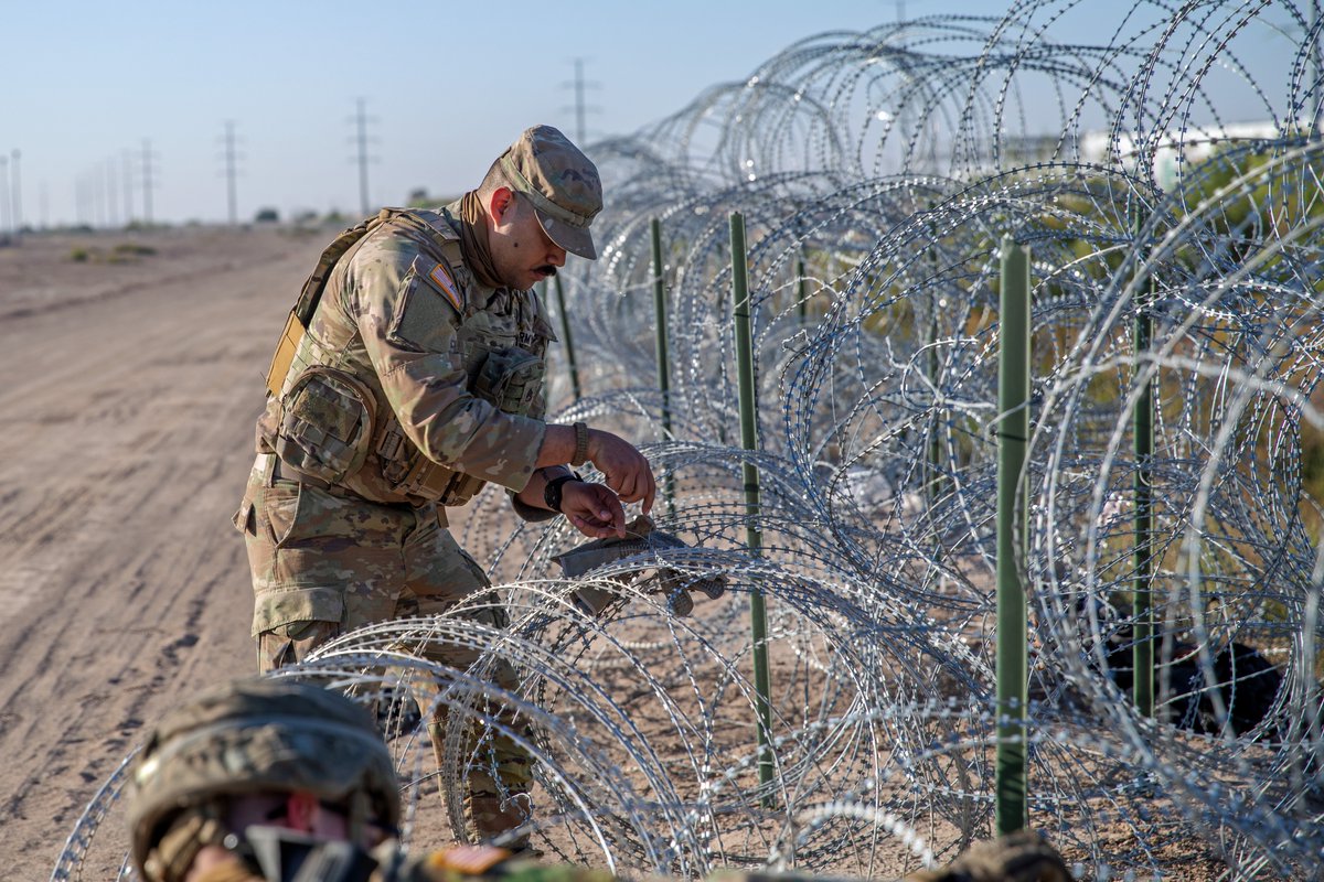 Texas National Guard soldiers repair razor wire barriers at the southern border near El Paso. Texas will continue to reinforce, repair, and install razor wire and anti-climb border barriers to stop illegal entry.