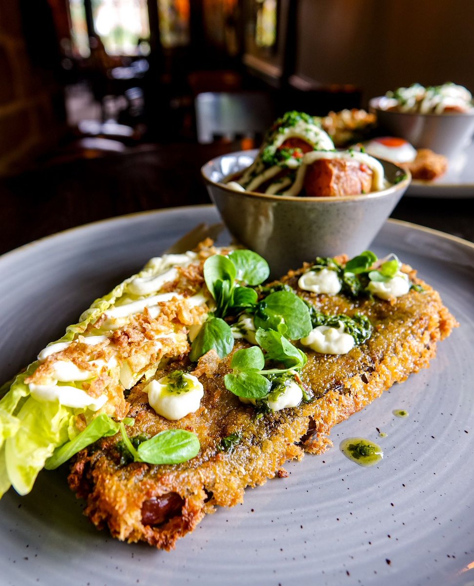 Piri-piri aubergine schnitzel with patatas bravas, Kos leaf salad and garlic aioli 💚

Who needs meat when veggies look this good? 🤩

@themoathouse

#TheLewisPartnership #Stafford