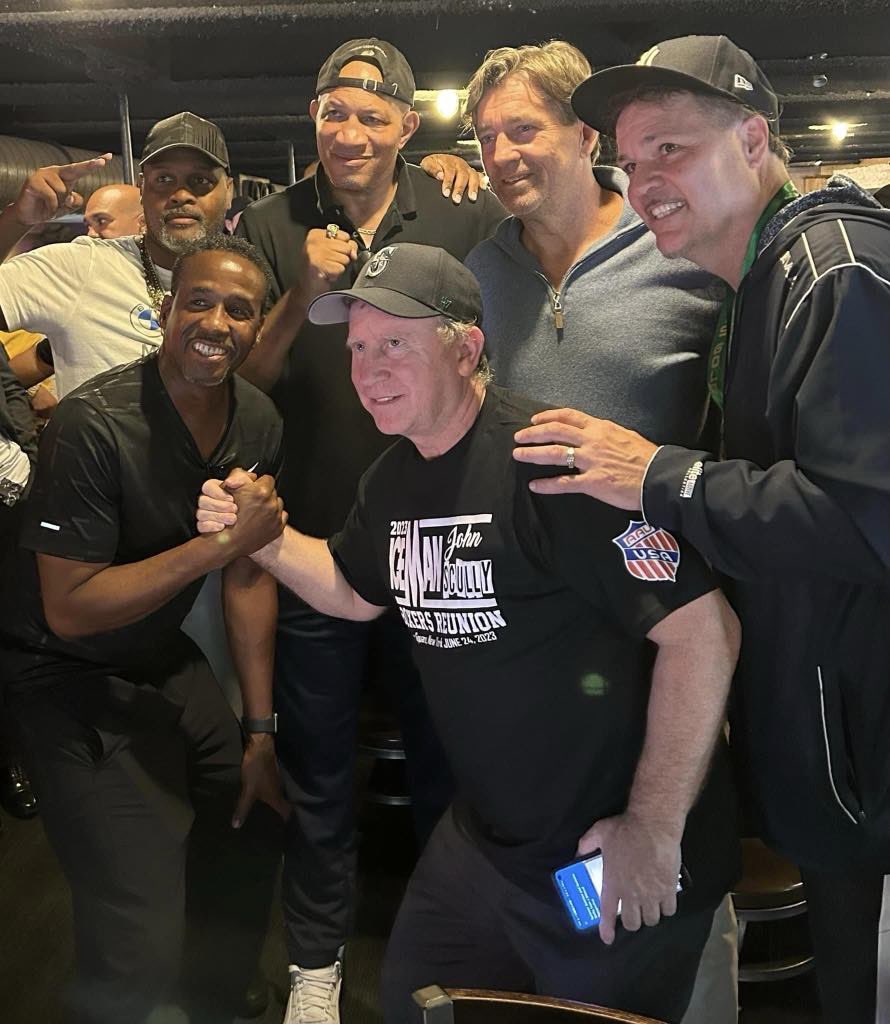LUNCH $ SAFE, NYC last June at amateur BOXING reunion, Dallas BBQ in Times Square! world title challengers Derrell Coley and John Scully flanking world champs Al Cole and Donny LaLonde with international level amateurs Michael Collins and Les Fabri in the front
