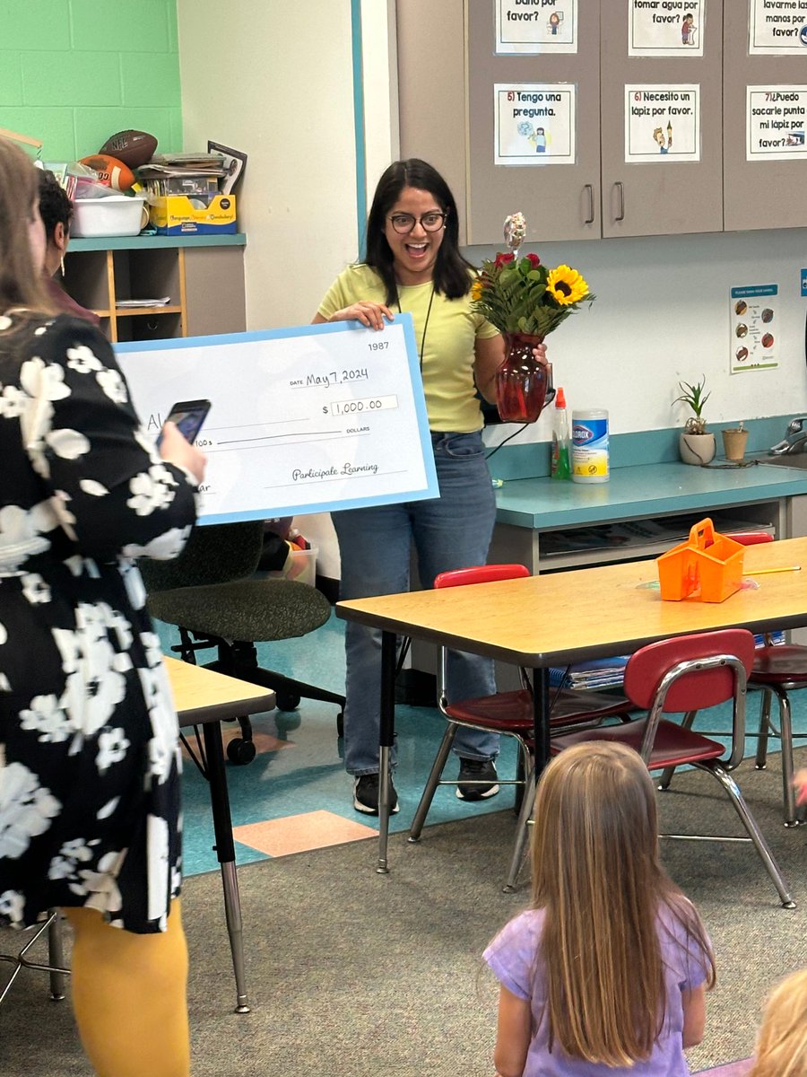 We are SO very proud of Iris Alonzo who was awarded the Local Advisor of the Year!  This is for all of NC, SC, and VA.  We loved surprising her in the classroom today and the students were so proud of their teacher!  Sra. Alonzo is the best!  #dualschool #participatelearning