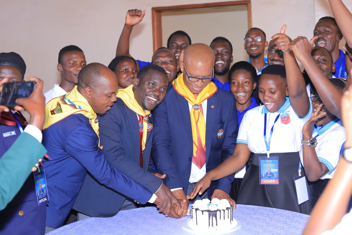 Public Campus Ministry leaders from Uganda Union cutting cake with Youth Ministry Leaders from General Conference and East African Division: Pr.Busi Kumalo and Pr.Samuel Mwebaza.