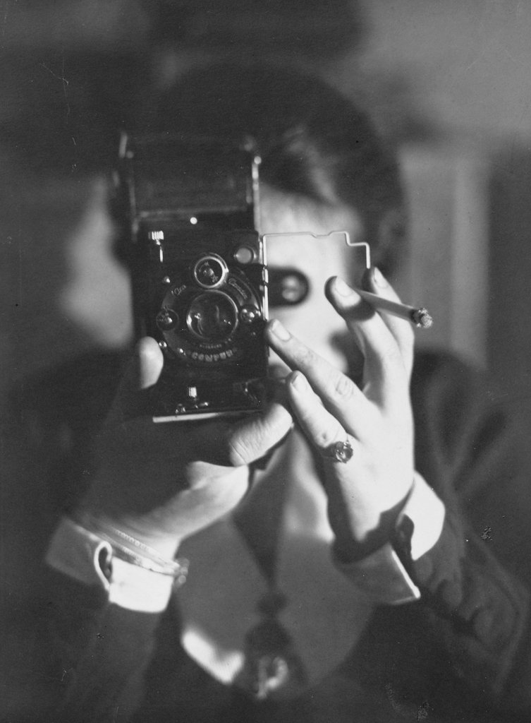 Germaine Krull, Self-Portrait with Cigarette, 1925