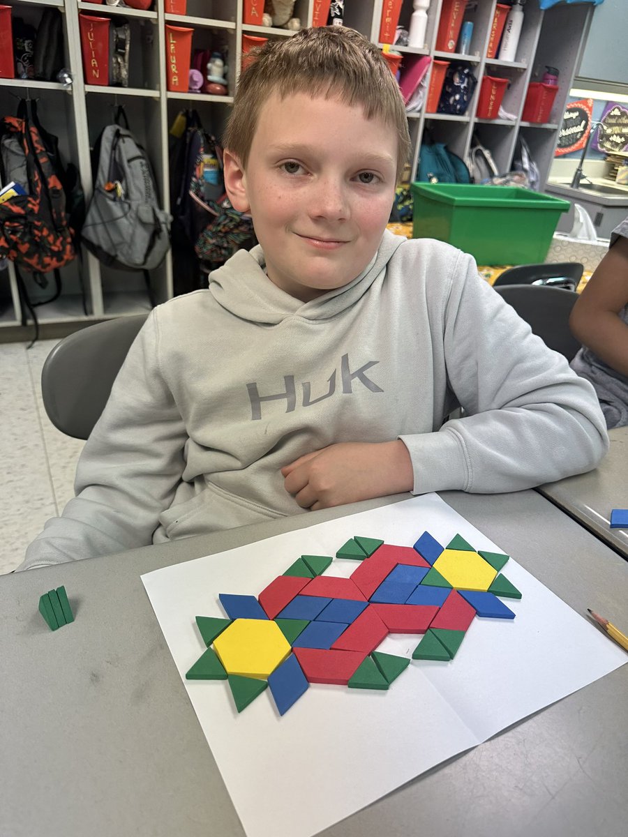 Challenging each other to build the symmetrical half of their designs <a href="/PleasantUnionYR/">Pleasant Union Elem</a>