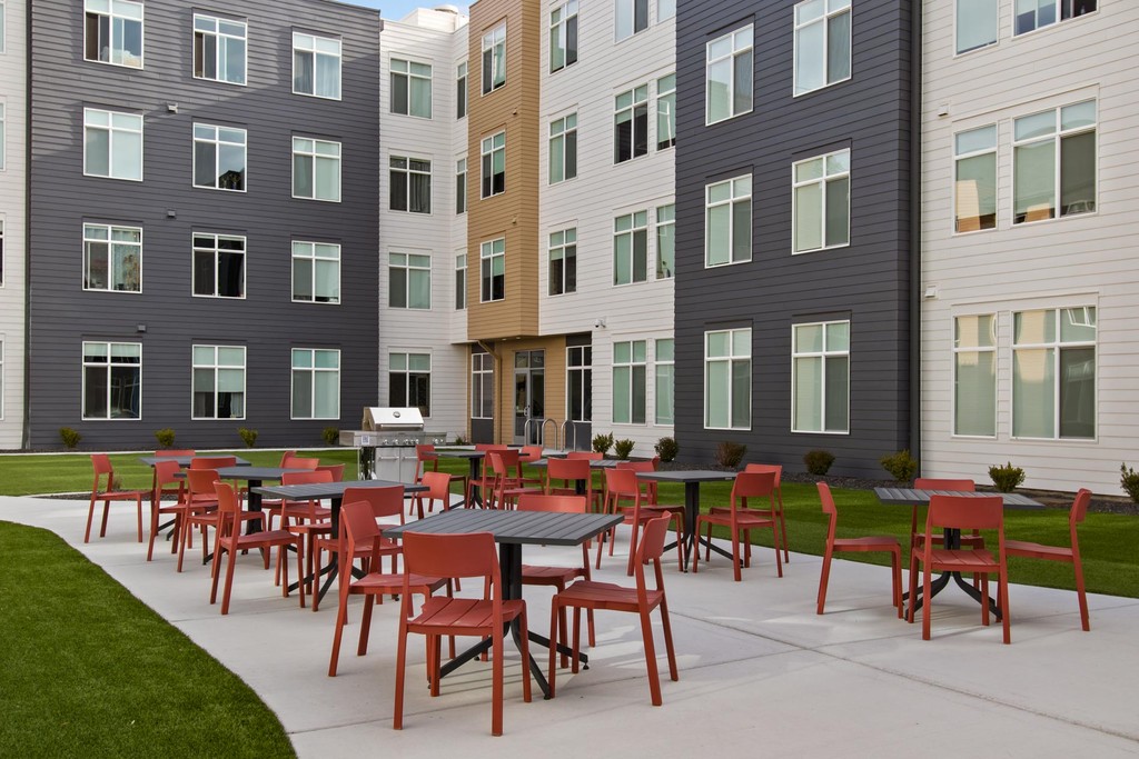 With our building surrounding our plaza it is easy access to get to the grill, fireplace and to get across building faster. Open year round, with timers for safety. Gather your friends to BBQ out! #TheBenjaminLofts #BenjaminLofts #ShowMeTheBenjamin #fyp #CheneyWA #SummerBBQ