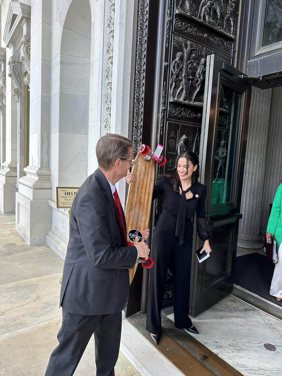 .@TimBurchett’s showing off his longboard to @AOC after votes this afternoon