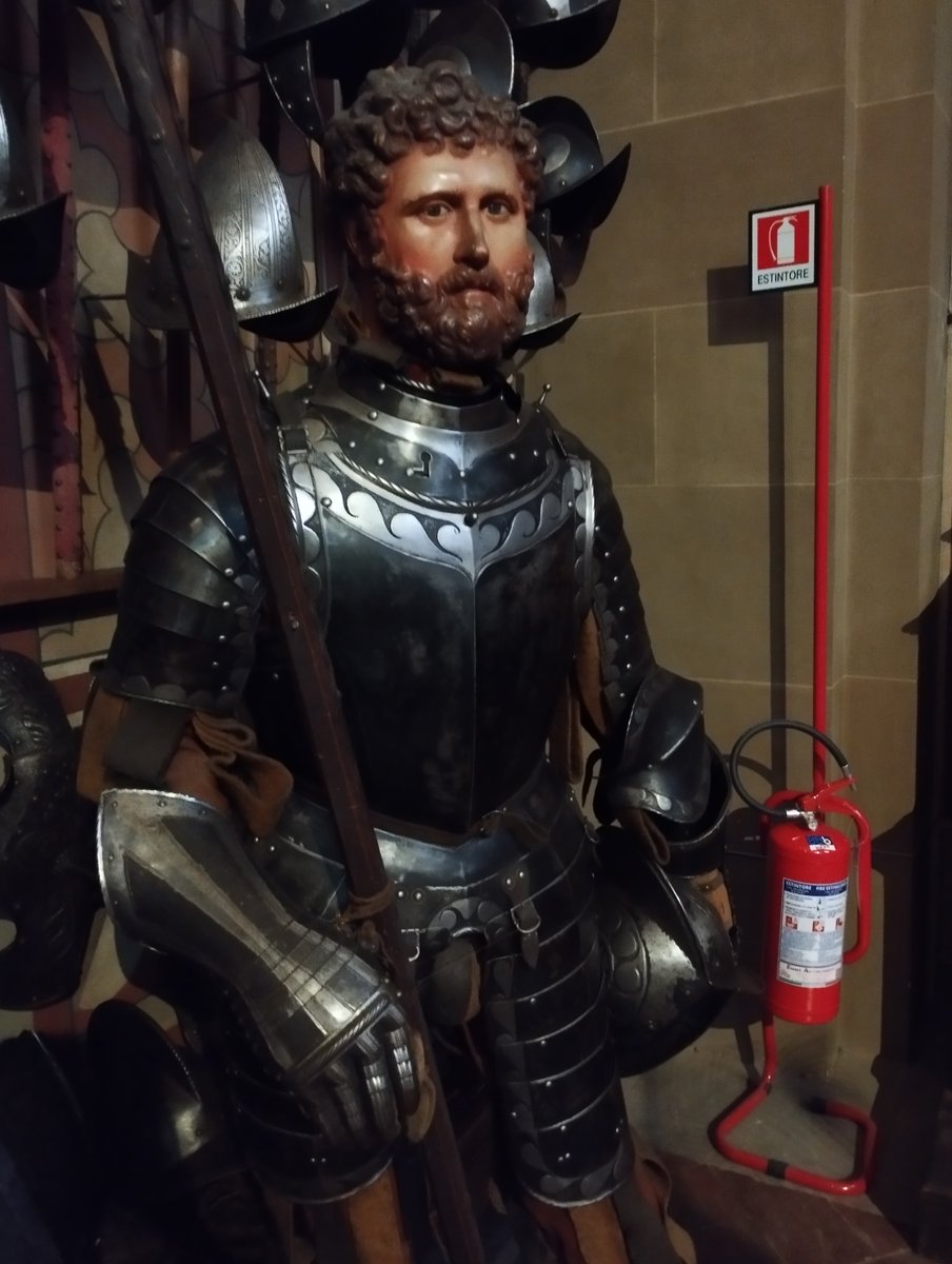 Which way renaissance soldier?

White polish, or blackened armor?