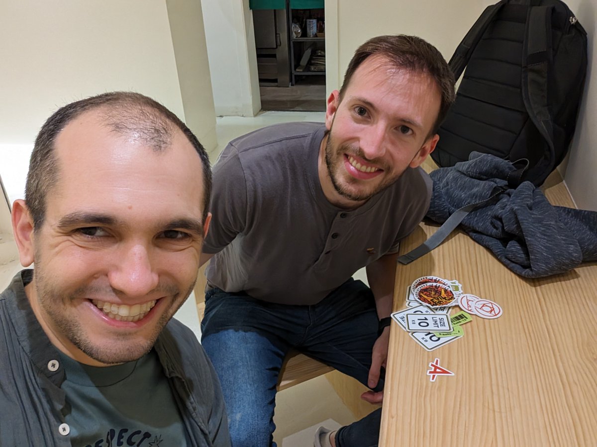 Just meet with @andresz_s and gave him Size Limit stickers because he wrote amazing GitHub Action for Size Limit to see the changes in your JS bundle size github.com/andresz1/size-…