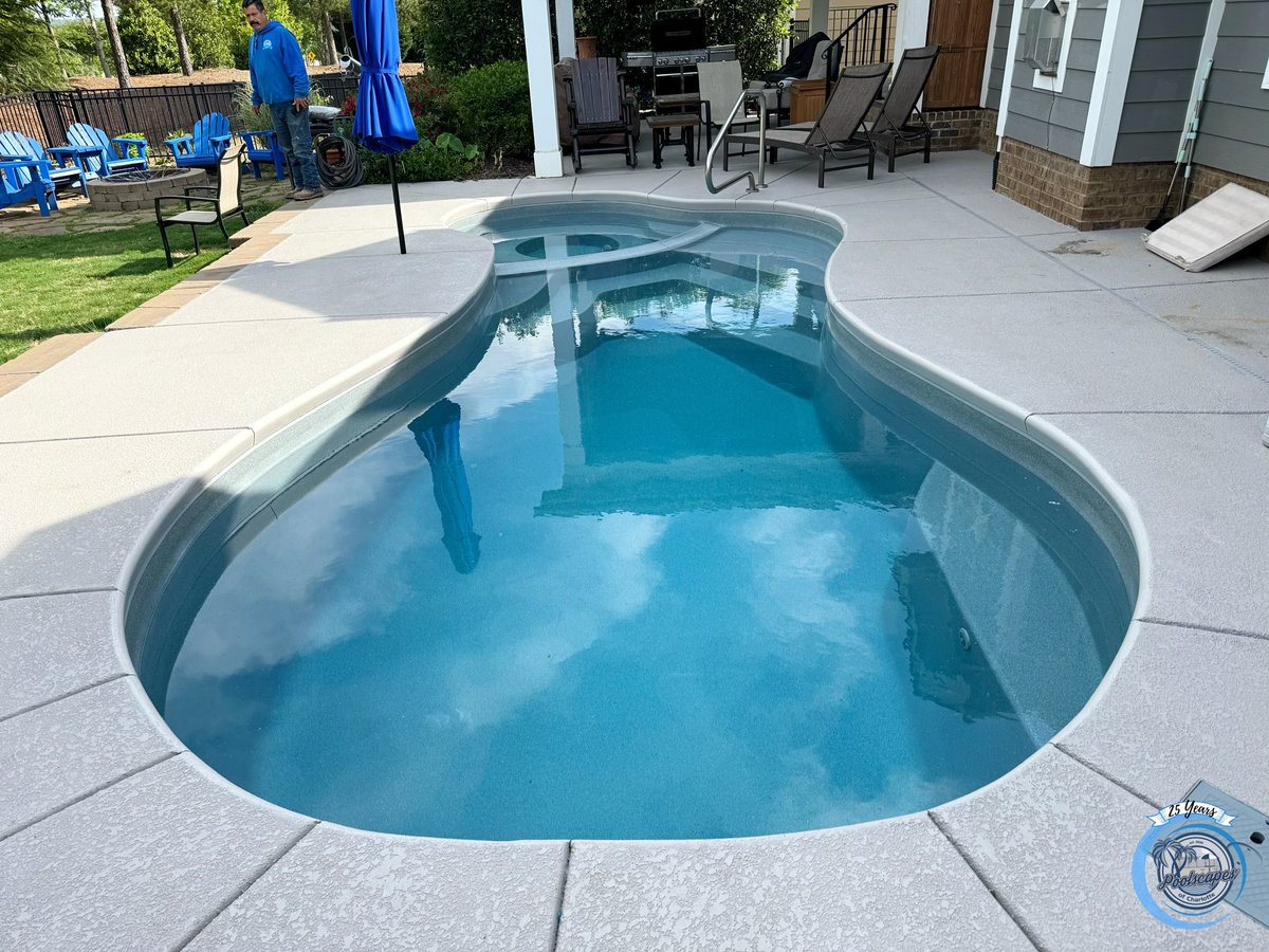 The Mandalay Bay #fiberglasspool model. This #pool features a built-in spa. #pooldesign