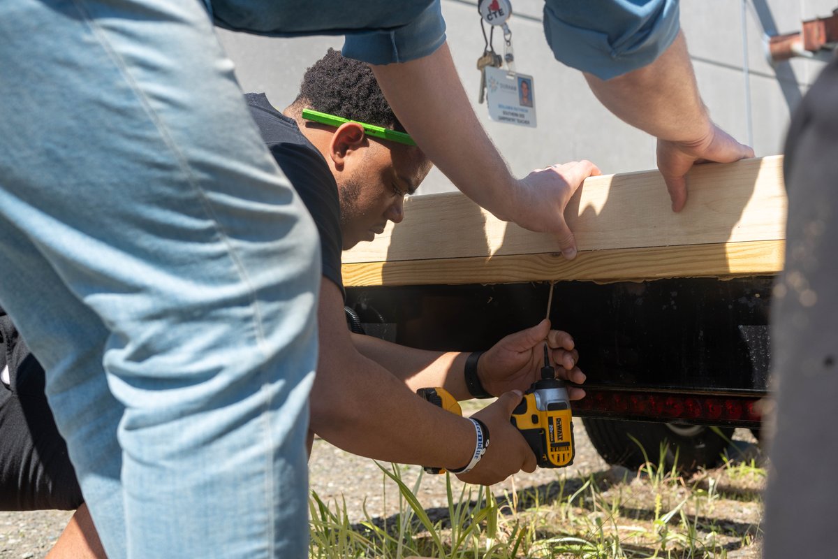 🛠️ Exciting news from Southern SES! Skilled trades students and teachers are constructing a 'tiny office' for the DPS Hub Farm, benefiting 3,000 students annually. Equipped with HVAC and custom desks, it's a true learning haven! Read more at DPSNC.net!