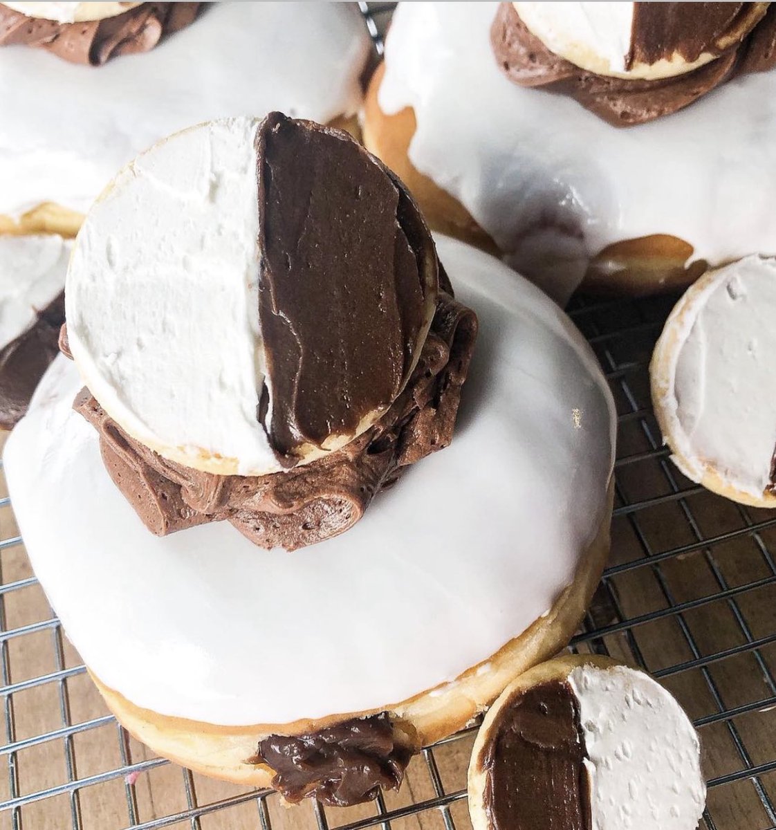 Fill It Friday Presents 👇🏻  
'The Half Moon ' 🌙⚡️✨ 
Our yeast donut filled with chocolate pudding, dipped in vanilla glaze , doll up of chocolate buttercream w topped with a mini half moon 🌙  #halfmoon #syracuseny