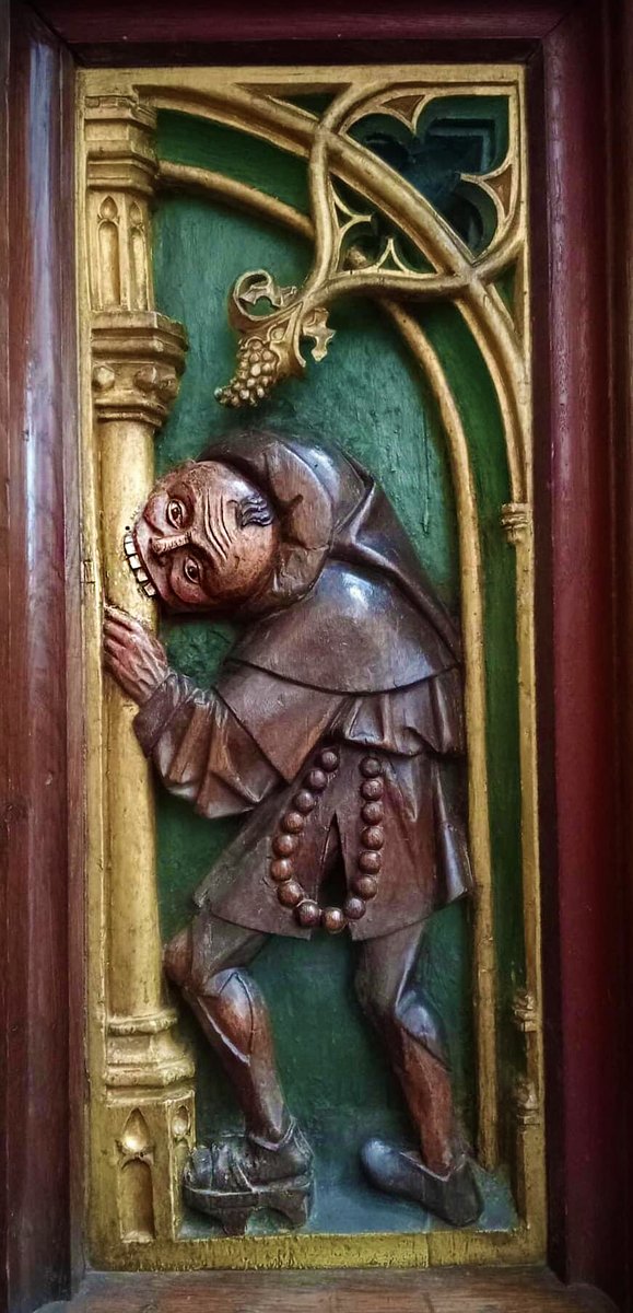 The Pillar-biter, 1509-1517 seen on the lower part of the choir screen of St. Bavo Church in Haarlem, the Netherlands.