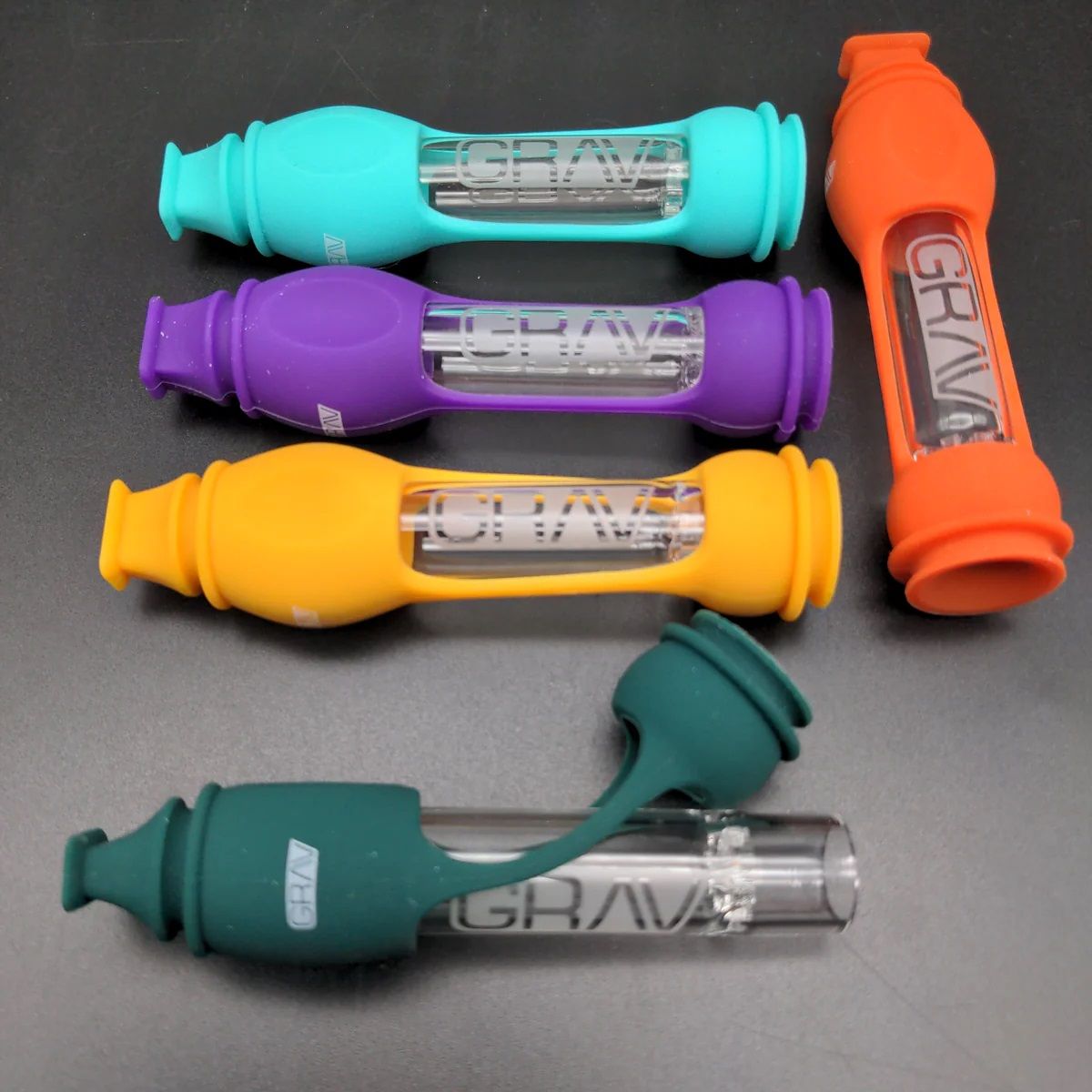 The 16mm GRAV® Octo-taster with Silicone Skin comes in assorted colors, offering both style and functionality. @Gravlabs headshop.com/collections/gr… #GRAV #Octotaster #SiliconeSkin #SmokingAccessory #Portable #Convenient #SmoothSmoking #Durable #HighQuality #AssortedColors