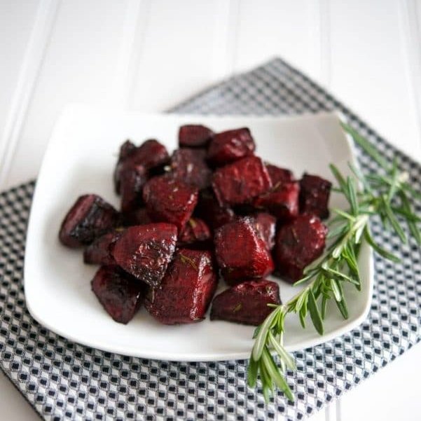 Fresh beets tossed with balsamic vinegar, fresh rosemary and extra virgin olive oil; then roasted until soft and tender. ♨️RECIPE--> carriesexperimentalkitchen.com/oven-roasted-b… #beets