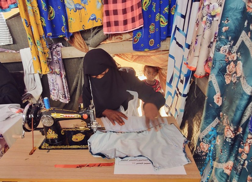 Ahlam faced difficulties when she fled from her home in Hajjah, #Yemen, becoming the sole provider for her five children and her husband, who is disabled. She enrolled in UNHCR's livelihood project and received a sewing machine +supplies to earn an income for her family.