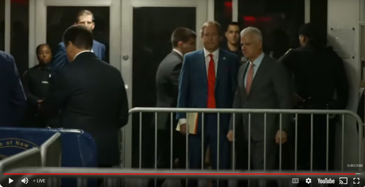 Spotted TX AG Paxton on the live cam! Paxton, similarly dressed in a blue suit and red tie, stood behind Trump as he gave a quick press gaggle before entering the courtroom.