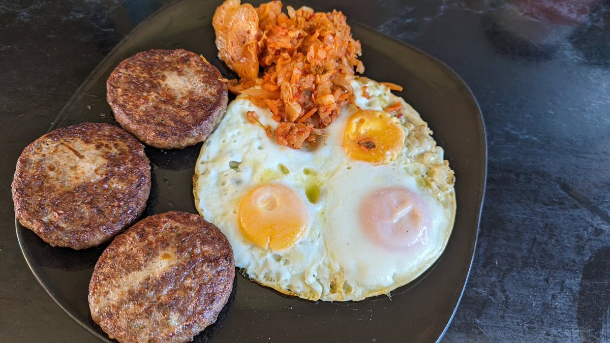 24hour fast broken with 3 burgers for every essential nutrient and vitamin and 3 large eggs fried in butter as well as a big helping of RAW kimchi to ensure my microbiome is happy and to ensure maximum absorption of everything I need from this meal into my body! #keto #omad