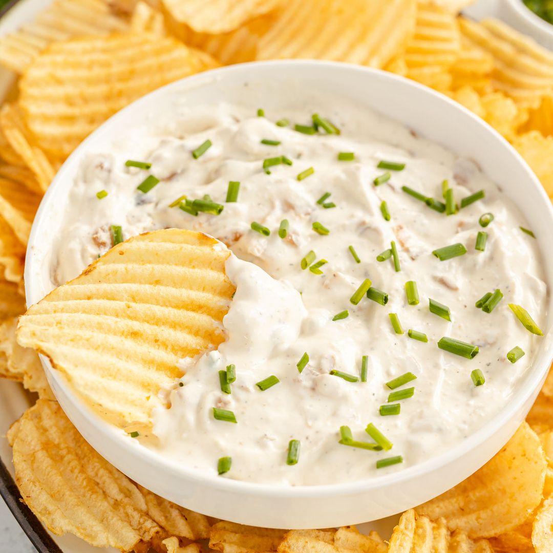 Rich and creamy, this homemade French Onion Dip recipe will be your go-to for gatherings! Super easy to make, with real ingredients, you'll love it!  #homemadedip #snackideas #appetizer #frenchonion #kyleecooks kyleecooks.com/french-onion-d…