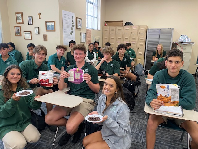 All juniors in our Catholic Social Teaching class are sampling Fair Trade chocolate and learning how the Fair Trade system supports the dignity of work and the rights of workers. Theology is delicious! 🍫