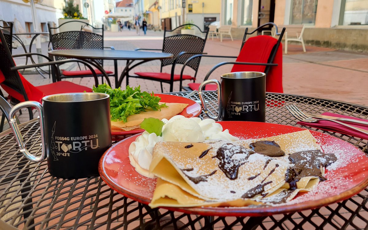 Spring has arrived in Tartu and the cafe season is open! ☕

We tested our official conference mugs outdoors! ☀

⬇ Don't forget to get your own merch before time runs out! They are only available via the online shop. ⬇

2024.europe.foss4g.org/registration/m…