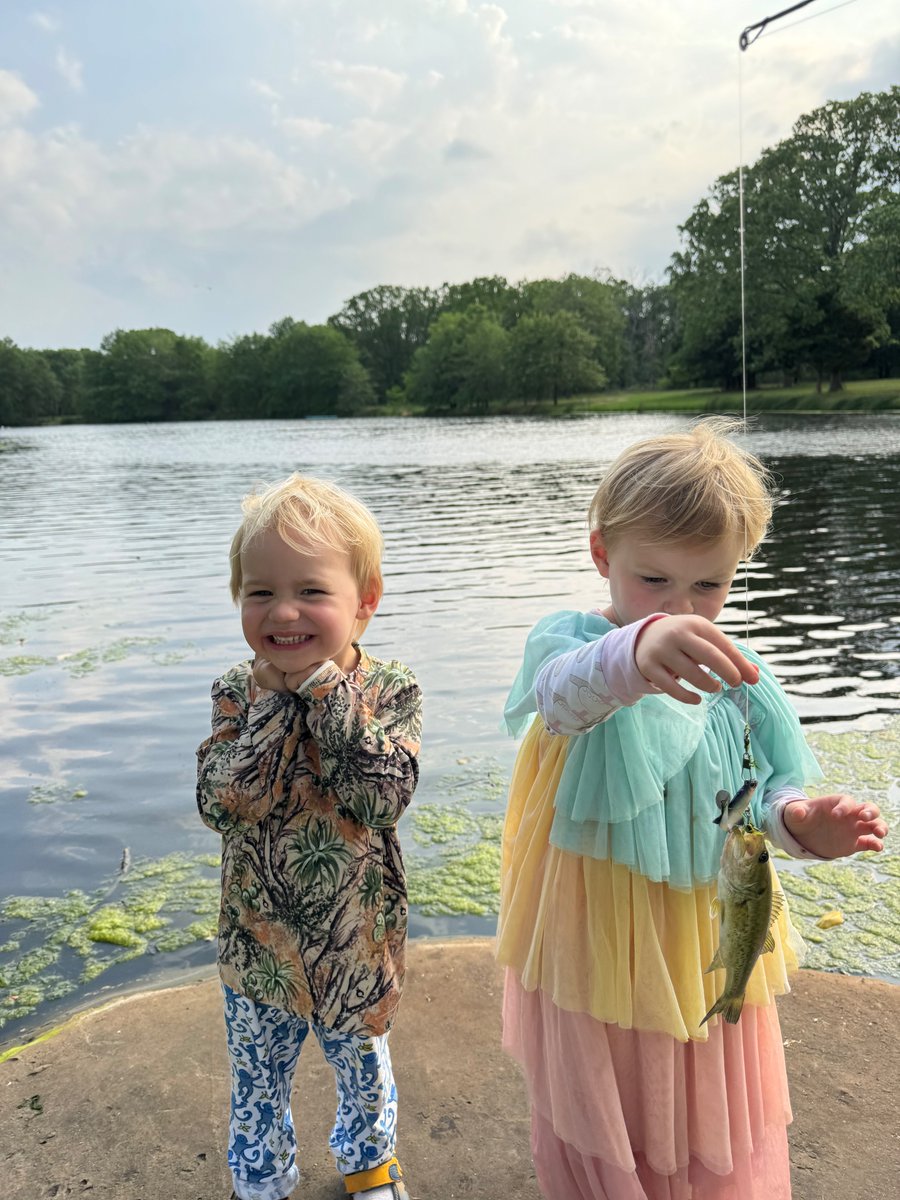 Two grands catching their first fish all by themselves.