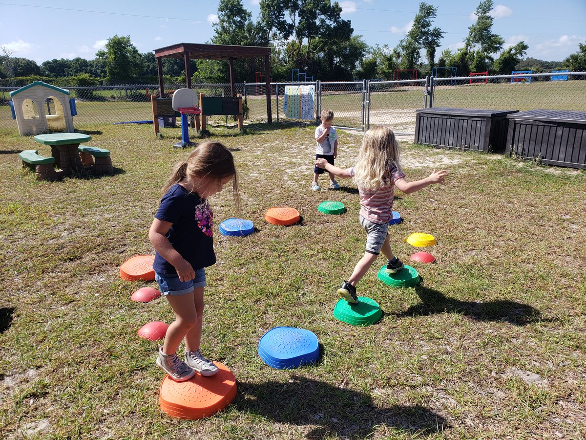 We have been practicing our balance and tossing with obstacle courses this week.