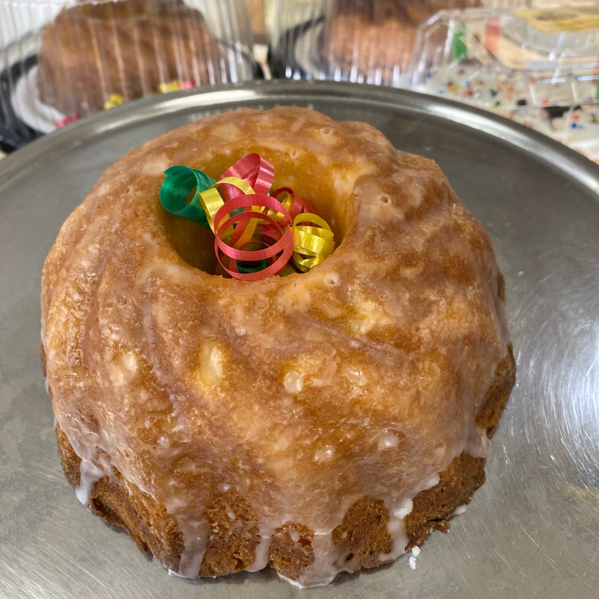 Fiesta Bundt Cake on feature this week! 
Moist cake with orange and pineapple, topped with butter crunch and glaze!
Stop by for a yummy sample!
#pastries #cookies #cakes #bundtcake #featureoftheweek
#florissant #bakery #familyowned #helferspastries