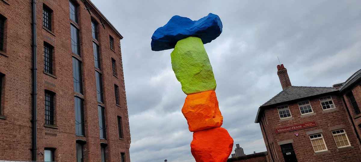 As per usual for this horrid month of April skies were grey again and the wind rattling around the Waterfront at the @theAlbertDock and @tateliverpool On such dreary days I always seek out a bit of colour to📸 #LiverpoolMountain always cheers you up whatever the weather ☁️☔️😉