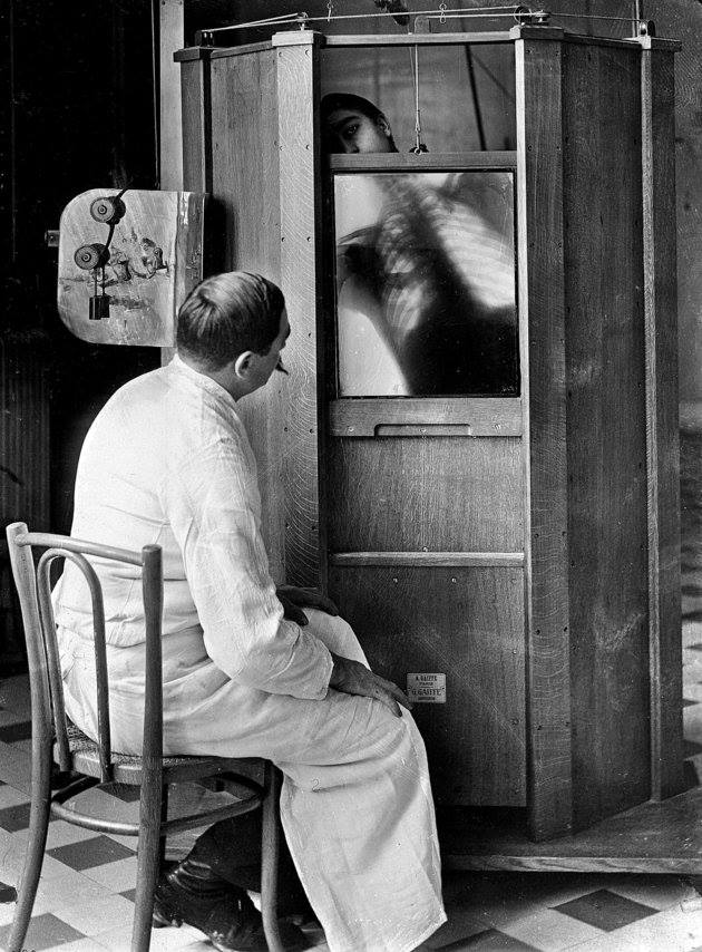 A chest X-ray in progress at Dr. Maxime Menard's radiology department at the Cochin hospital in Paris, c.1914.