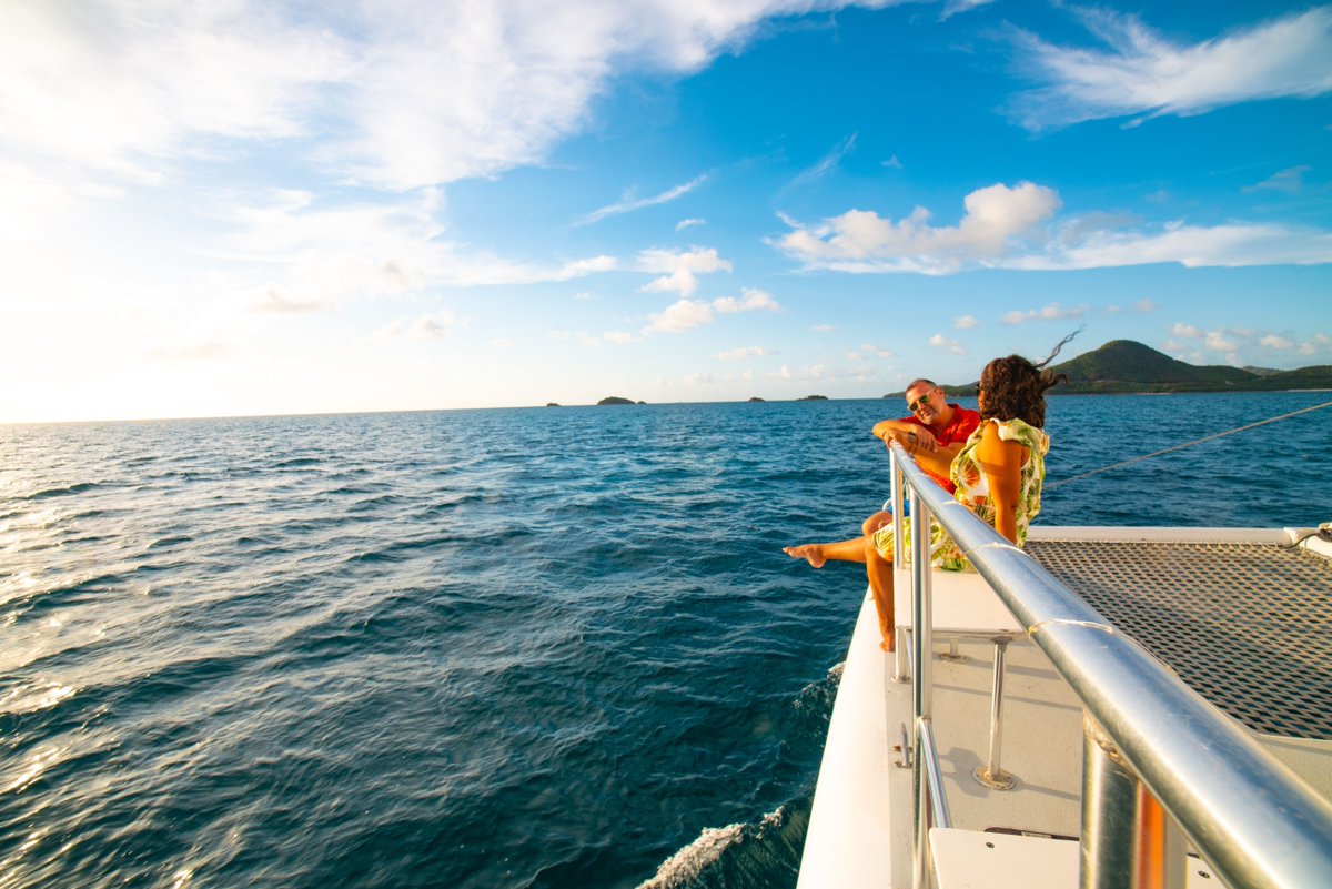 Sail away into the sunset on a romantic catamaran cruise, with breathtaking views of Antigua coastline while enjoying a magical evening on the waters. #AntiguaandBarbuda #islandlife #yachtinglifestyle #traveldestinations #travelinspiration #nauticallyantiguabarbuda