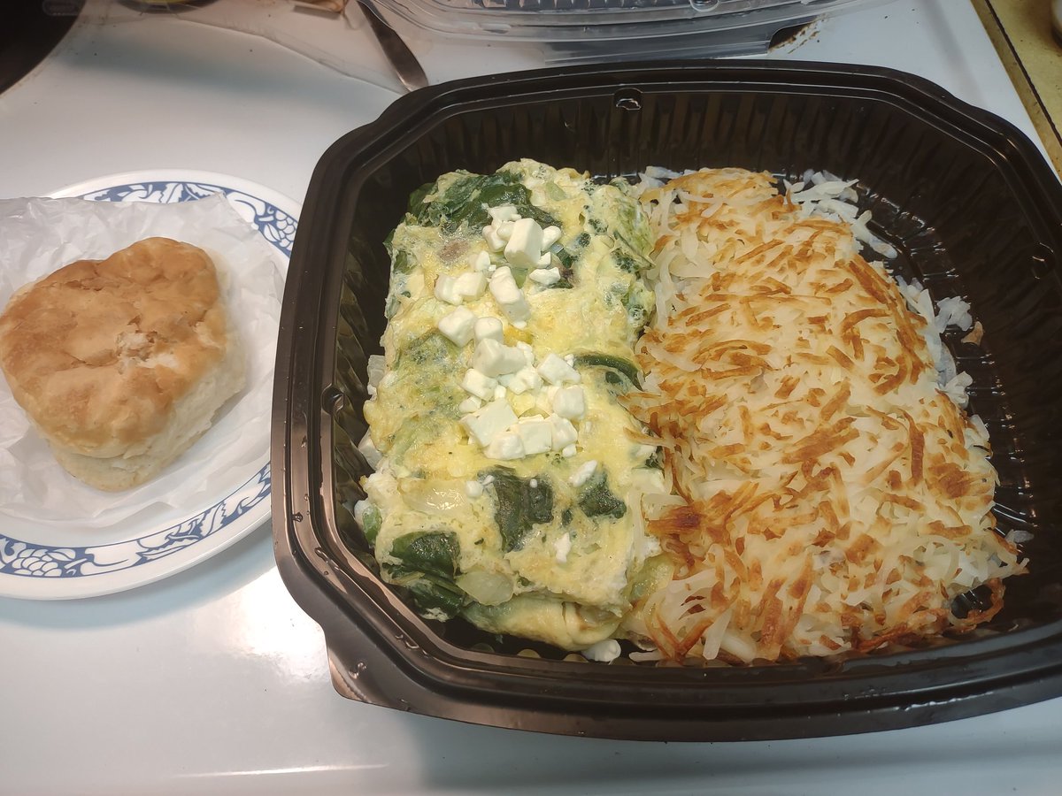 I got a veggie omelette with broccoli, mushrooms, onions, green peppers, spinach, and feta cheese along with hashbrowns and a BISCUIT for breakfast