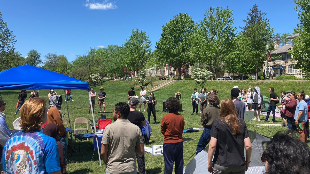 The multifaith day of solidarity and defense is kicking off now, with Muslim, Jewish and Christian leaders speaking in the IU encampment.