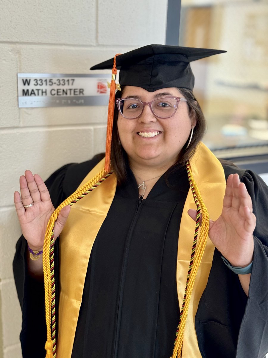 One of my graduation pictures. This is at the @CenturyCollege mathematics resource center ❤️