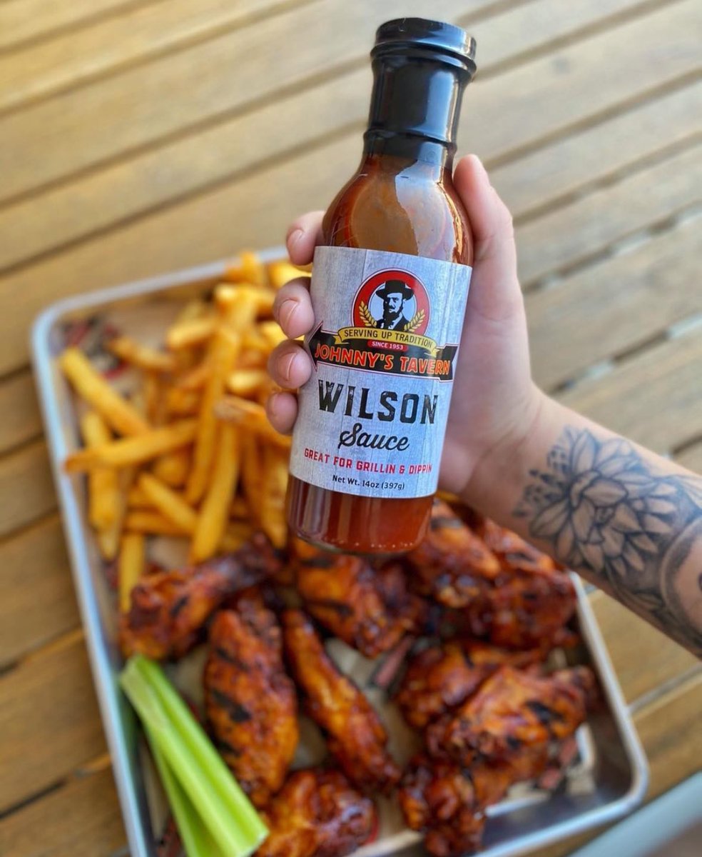 Flash fried, finished on the grill, and served on a bed of fries — Wilson Wings are always the answer!