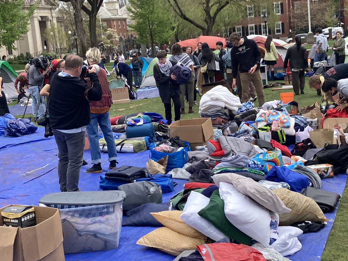 .@BrownUniversity students pack up their encampment in exchange for the governing Corporation considering their proposal for divestment from companies that profit from human rights abuses in Palestine, at their October meeting.