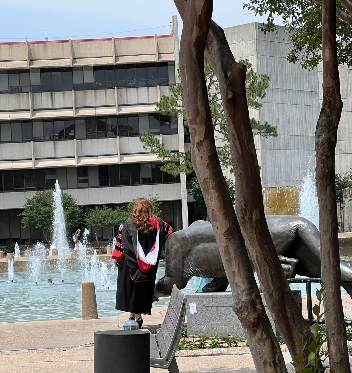 That time of the year… graduates are coming to the fountain to get their photos with Cougars!